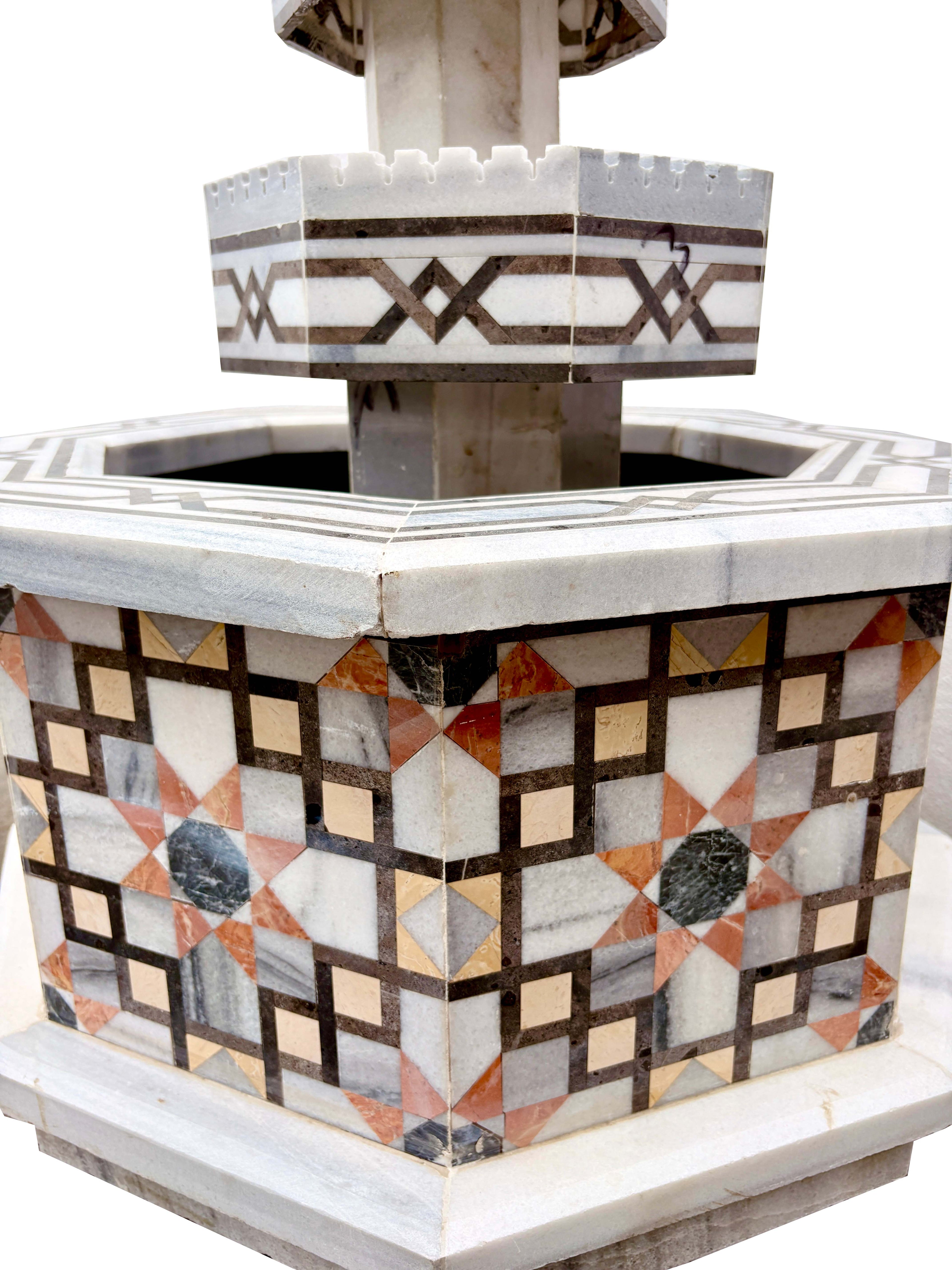 Octagon-Shaped Marble Water Fountain with Geometric Patterns