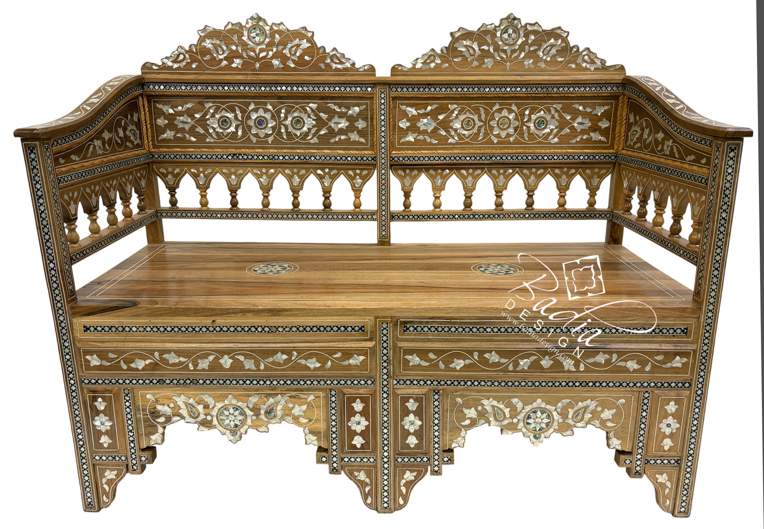 Decorative wooden bench with intricate carvings on a white background