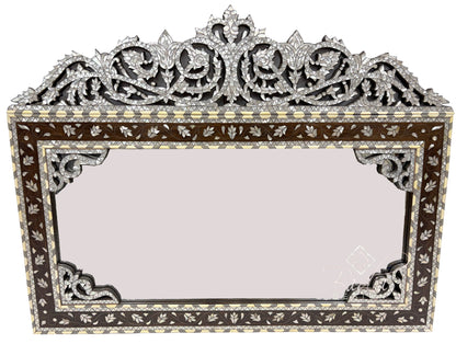 Decorative rectangular mirror with intricate floral patterns on a white background