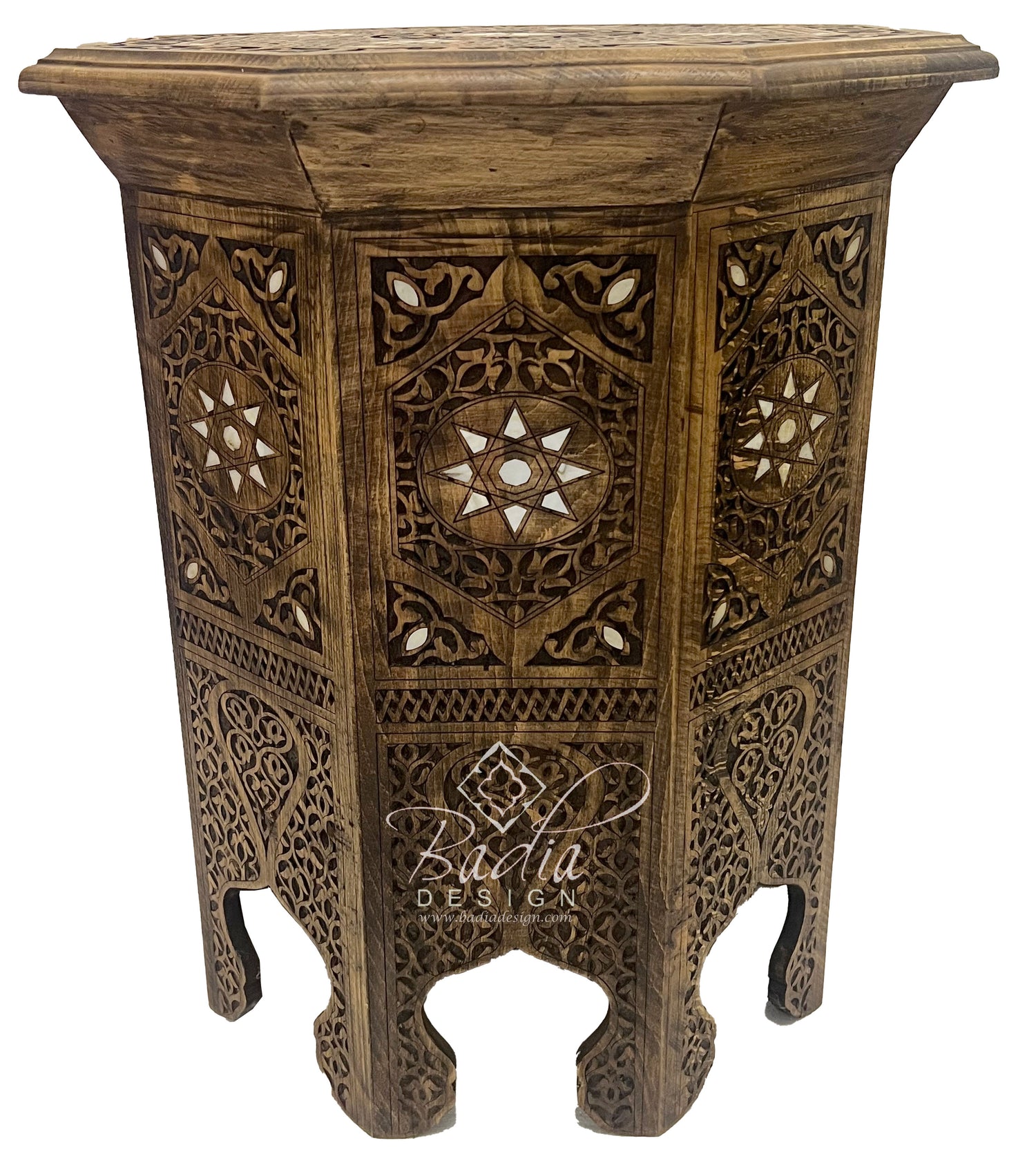 Wooden side table with intricate carvings and &