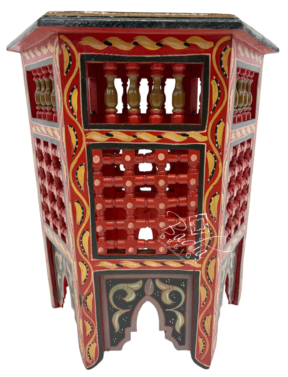 Decorative wooden cabinet with intricate designs on a white background