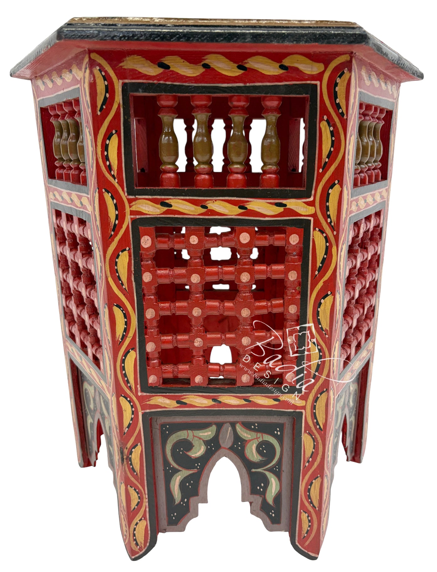 Decorative wooden cabinet with intricate designs on a white background