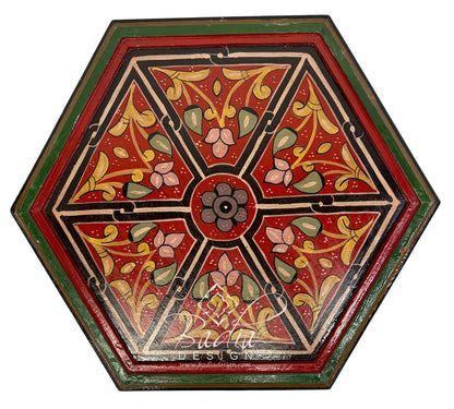 Decorative hexagonal panel with floral patterns on a white background