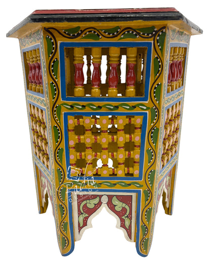 Decorative wooden side table with colorful patterns on a white background