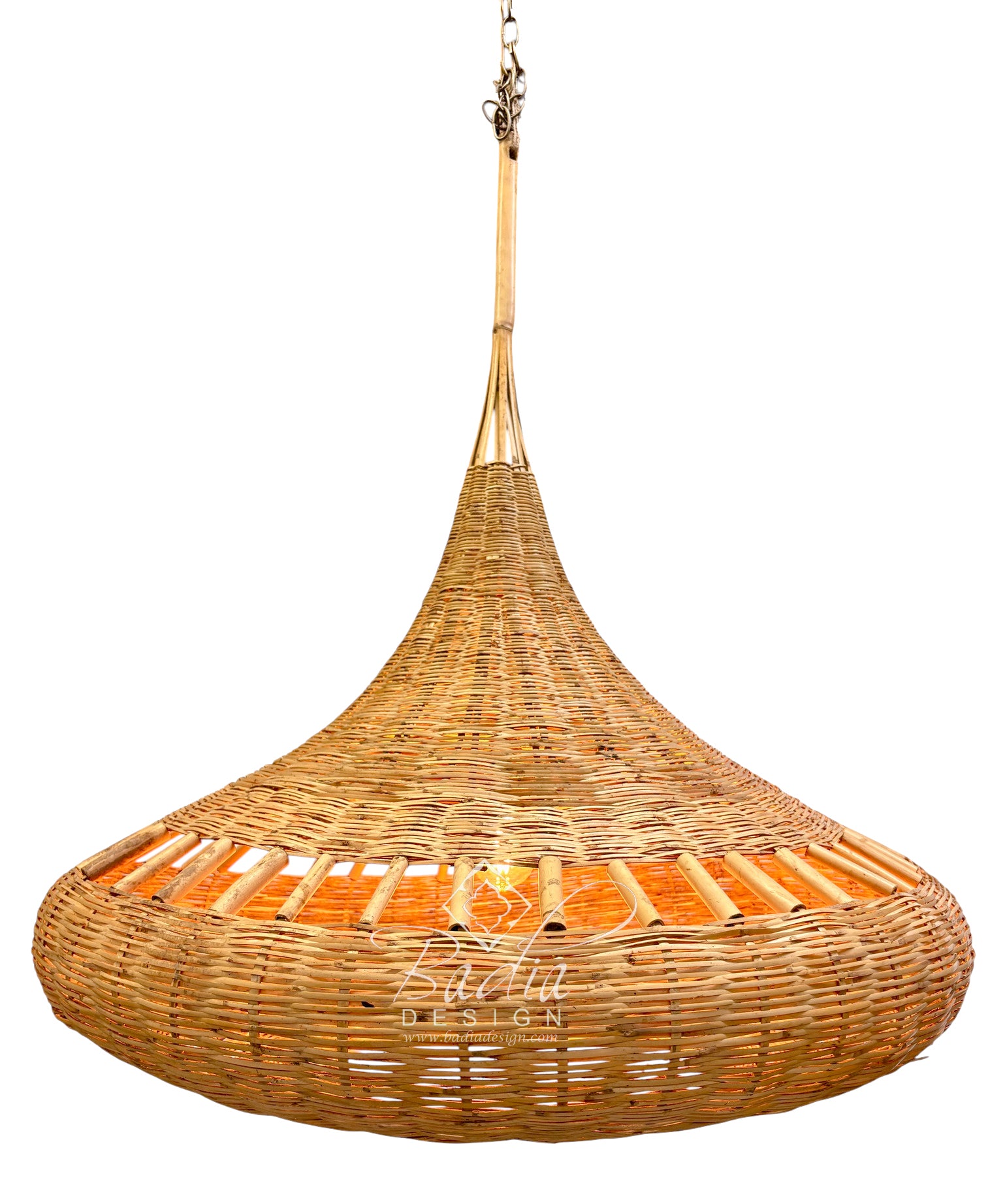 A large, teardrop-shaped woven pendant light made from natural rattan or wicker, suspended by a wooden rod and chain against a plain white background. Moroccan Raffia Hanging Lantern with Woven Natural Fiber Design