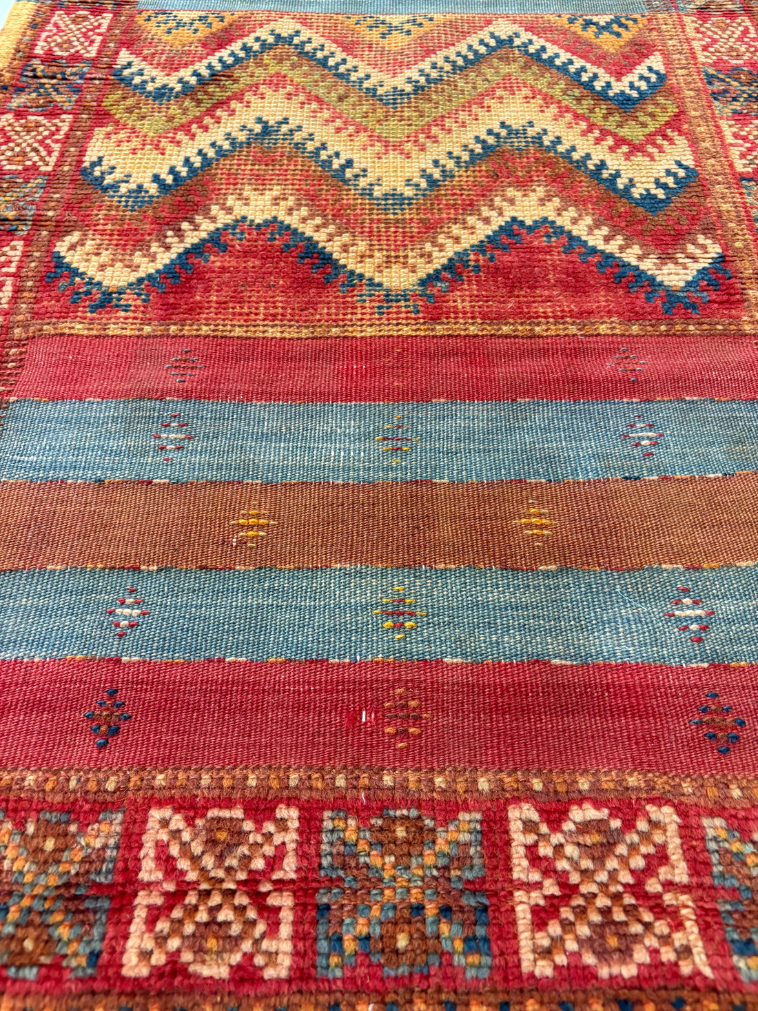 Red and Multi-Color Tribal Rug