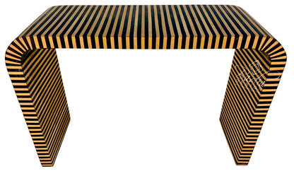 A modern console table with a curved rectangular top and sculptural legs, featuring a glossy striped pattern of black and warm golden-brown wood tones, shown on a plain white background.