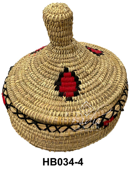 Moroccan Woven basket with decorative elements on a white background