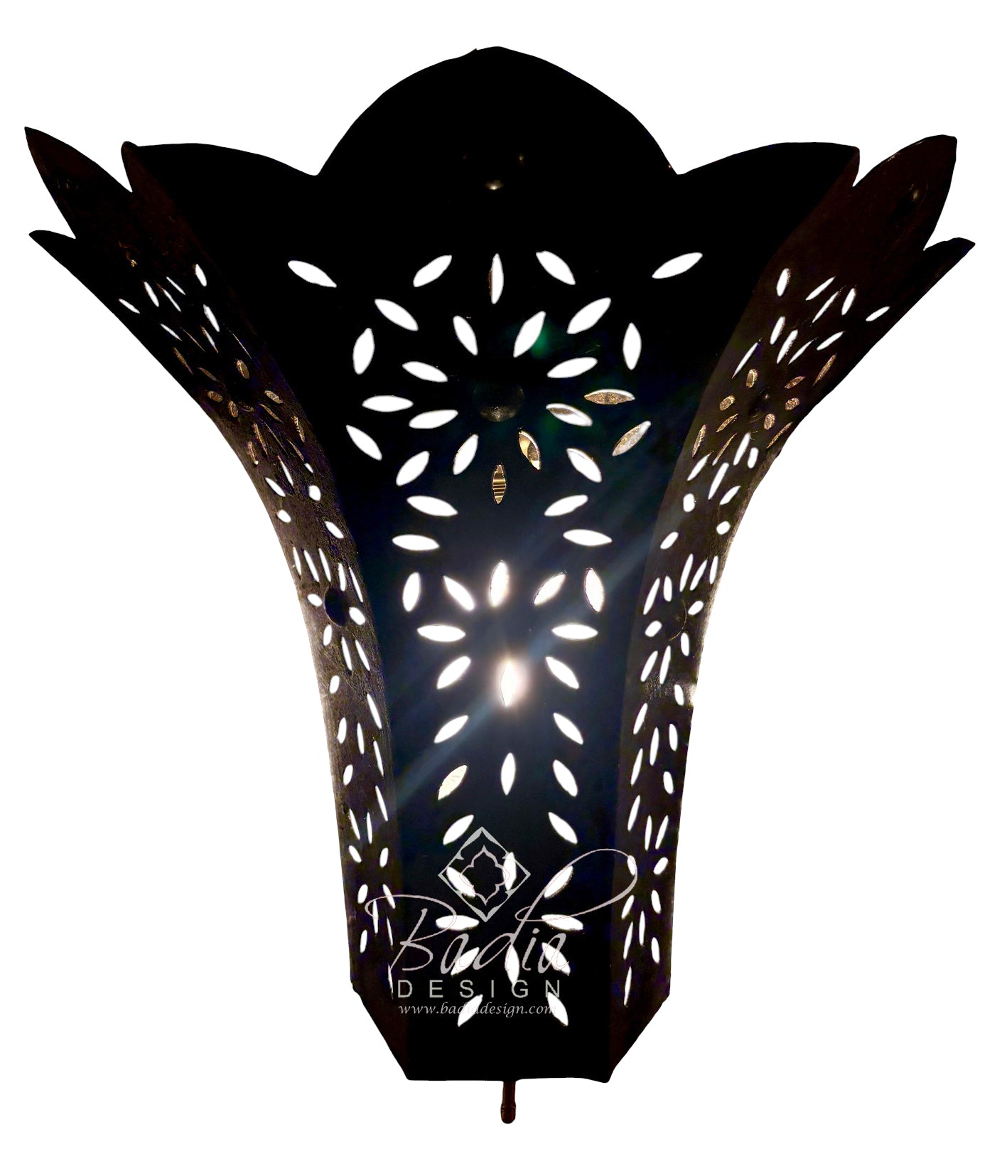 A black metal wall sconce with a sculptural, lotus-like silhouette and intricate laser-cut floral patterns, shown against a plain white background with a watermark at the bottom.