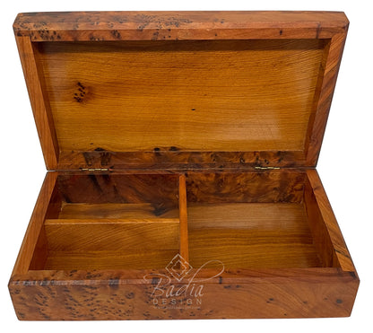 Wooden box with a hinged lid on a white background, featuring the Badia Design logo.