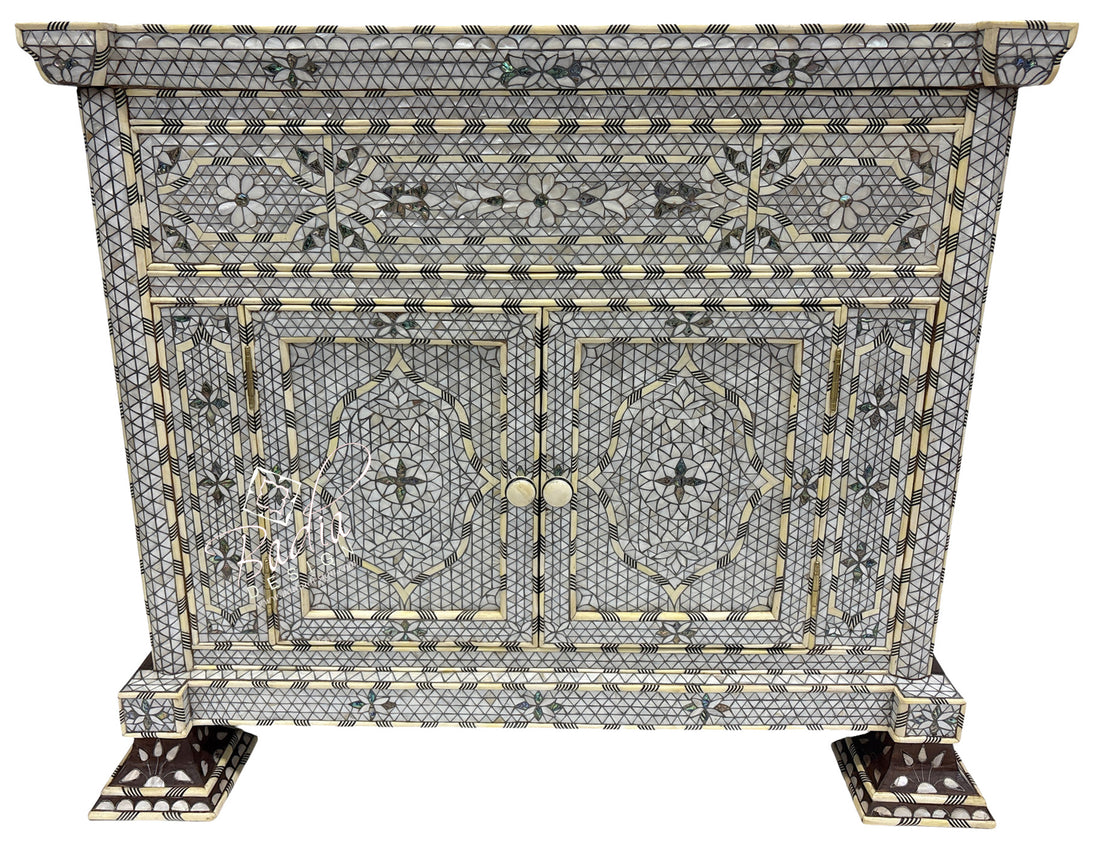 Decorative cabinet with intricate mosaic pattern on a white background