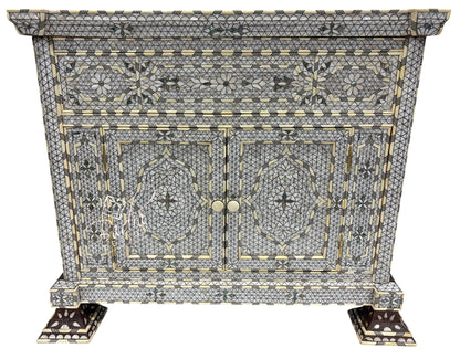 Decorative cabinet with intricate mosaic pattern on a white background