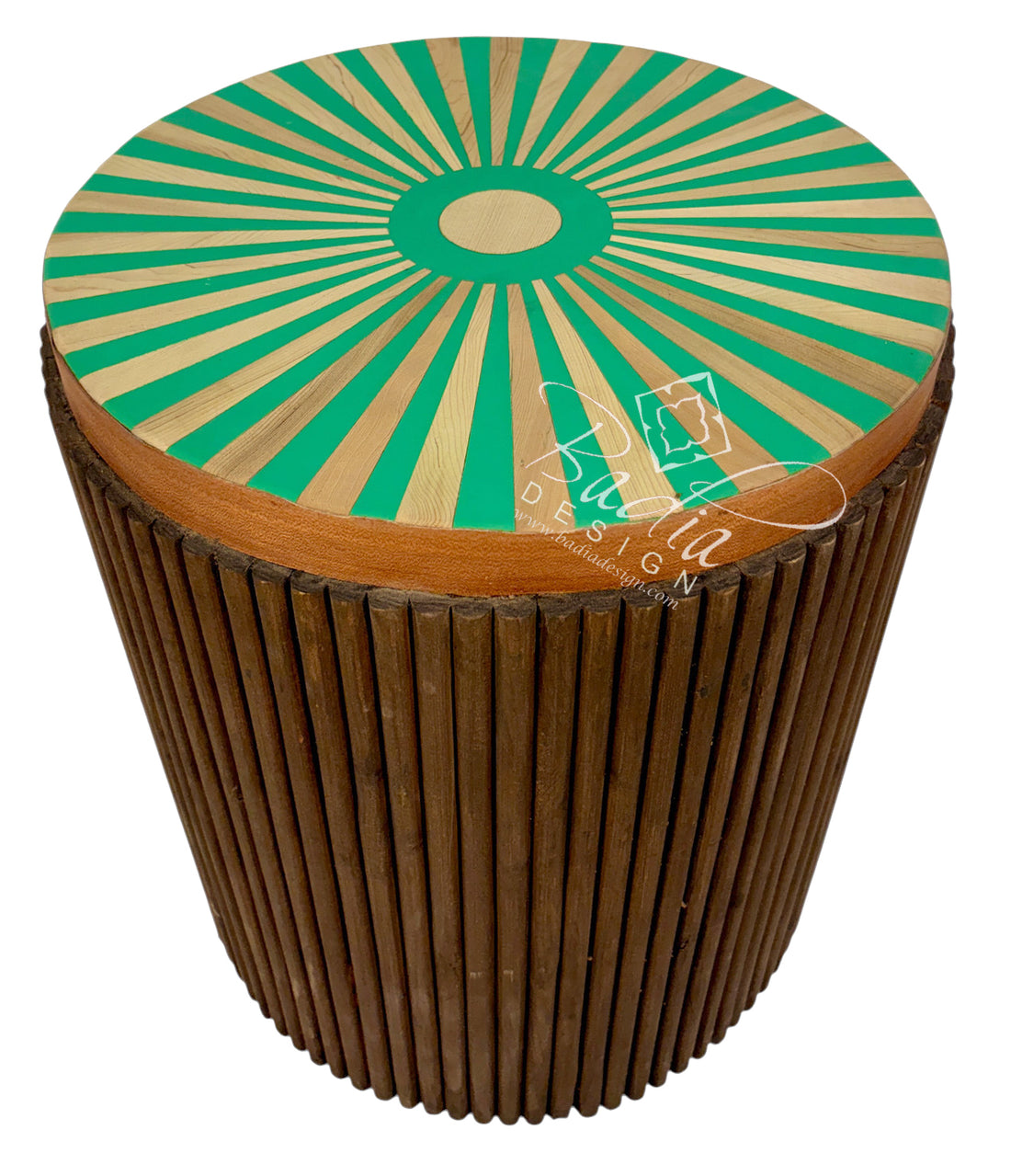 A modern lime green cylindrical side table or stool with a fluted brown wood base and a circular top featuring a green and beige sunburst pattern, shown on a white background.