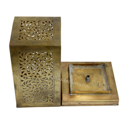 Bronze decorative box with intricate cut-out patterns on a white background