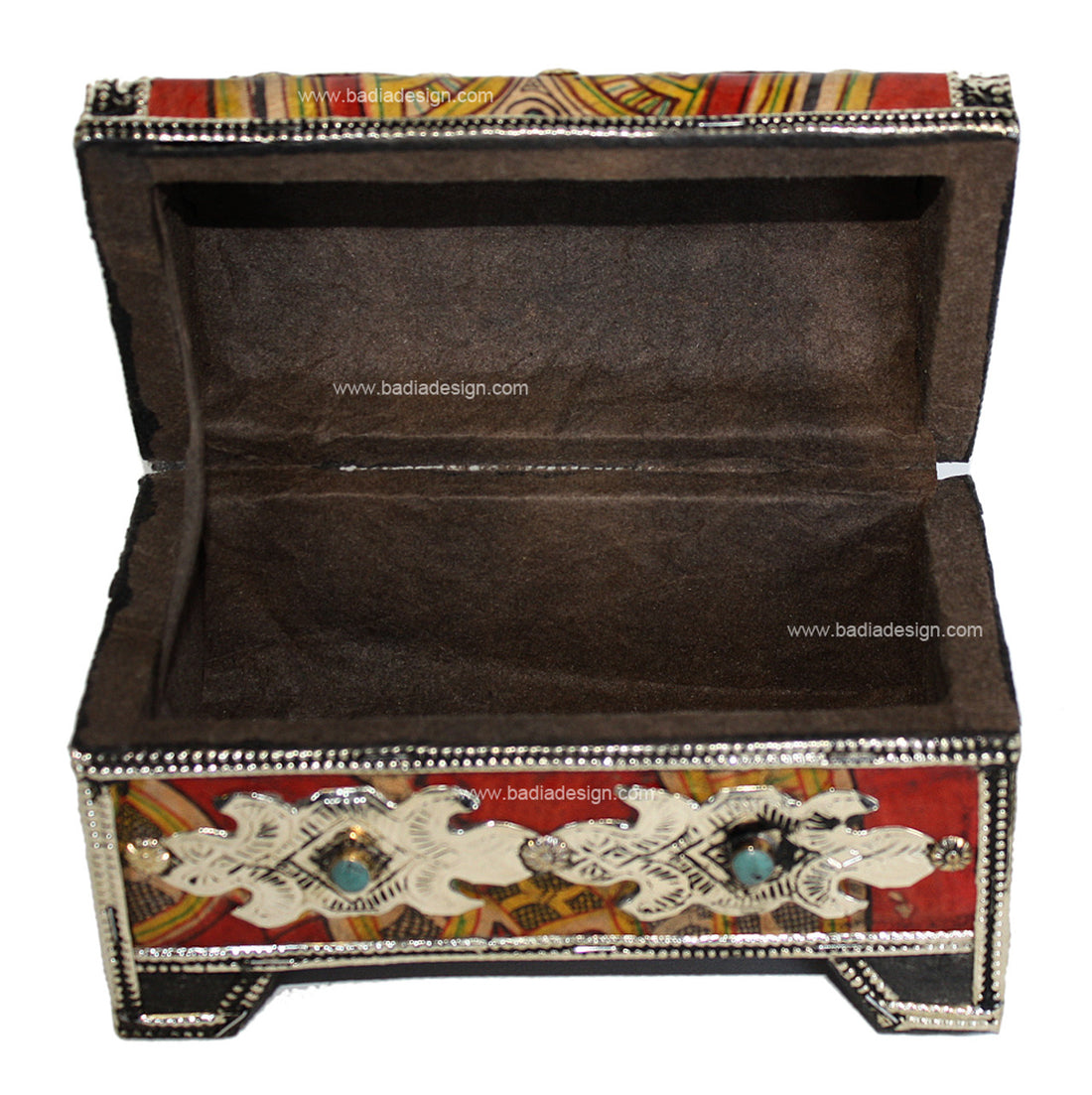 Decorative jewelry box with intricate designs on a white background