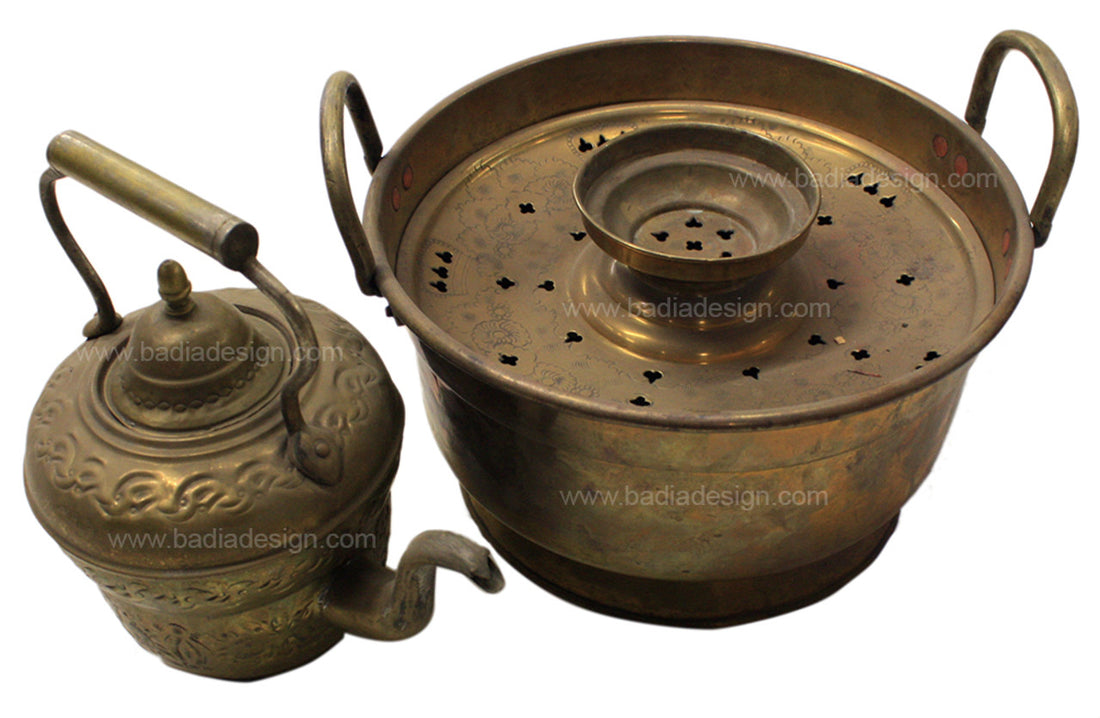 Bronze lamp and steamer set on a white background