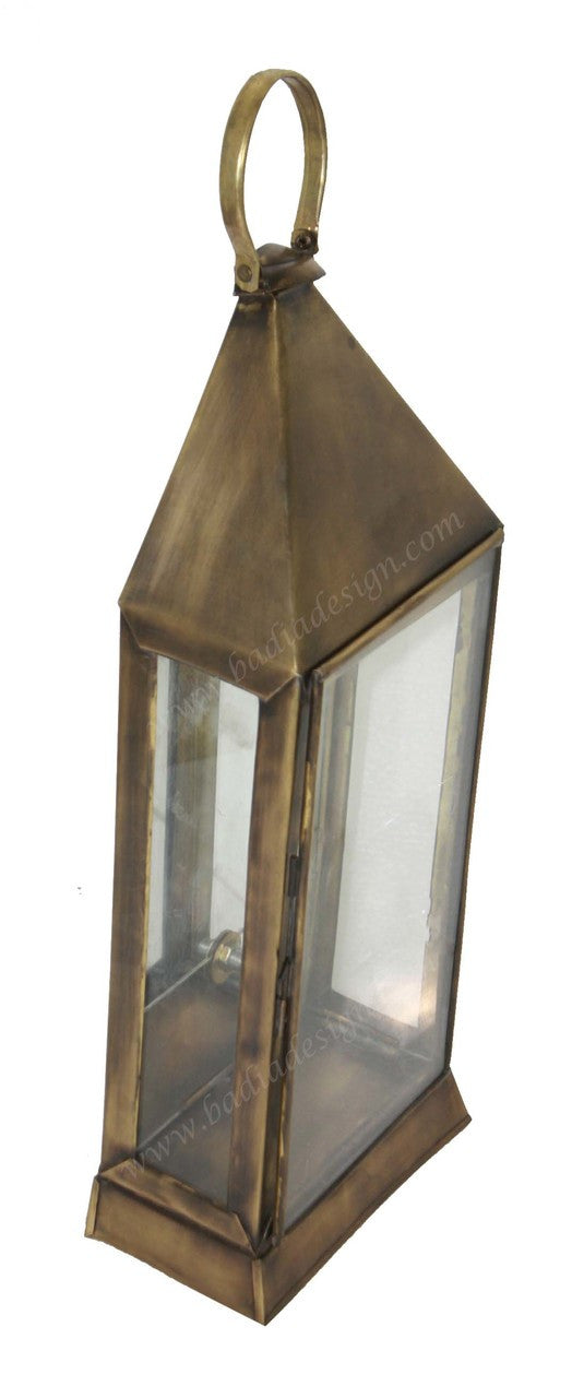 Bronze lantern with glass panels on a white background
