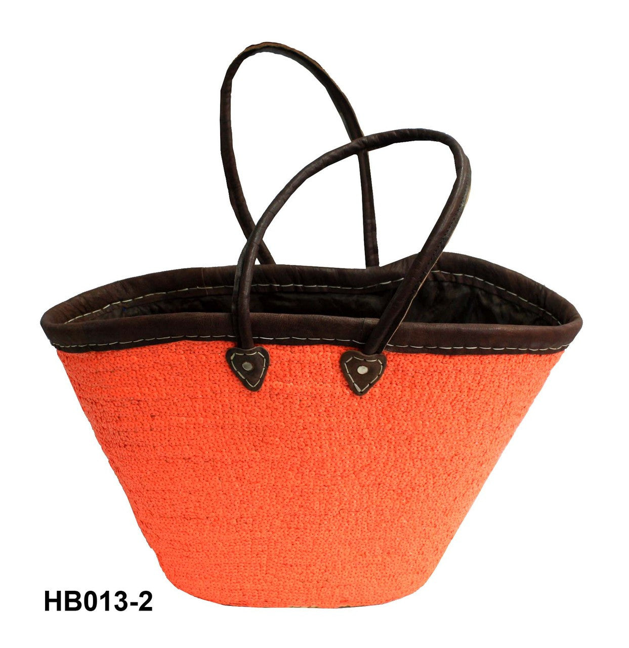 Orange straw bag with black handles on a white background