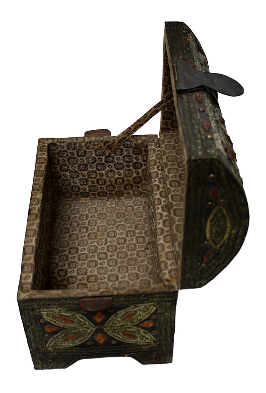 Decorative wooden basket with intricate patterns on a white background