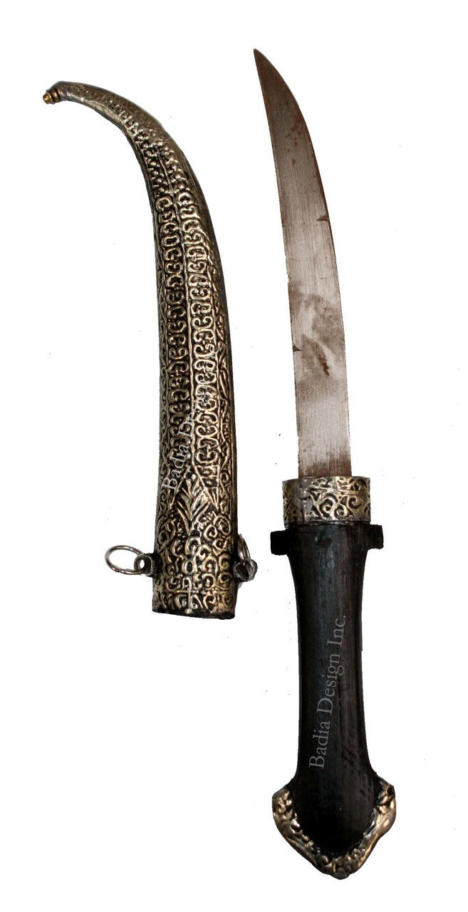 Decorative knife with ornate sheath on a white background