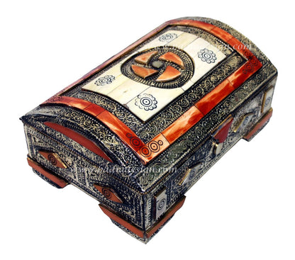 Decorative jewelry box with intricate patterns on a white background