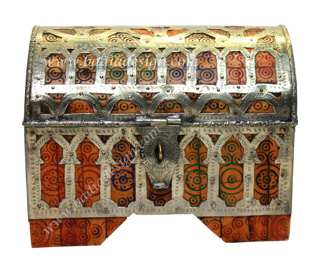 Decorative jewelry box with intricate patterns on a white background