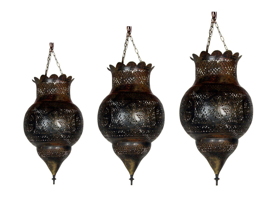 Three ornate hanging lanterns on a white background