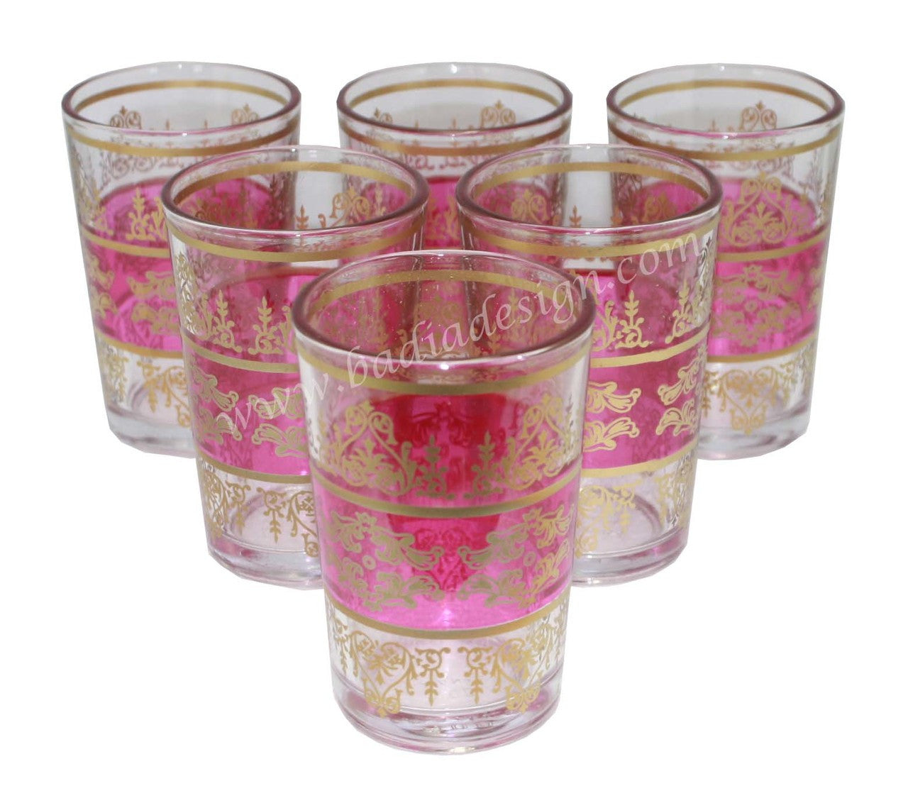 Set of six tea glasses with pink and gold decorative patterns on a white background.