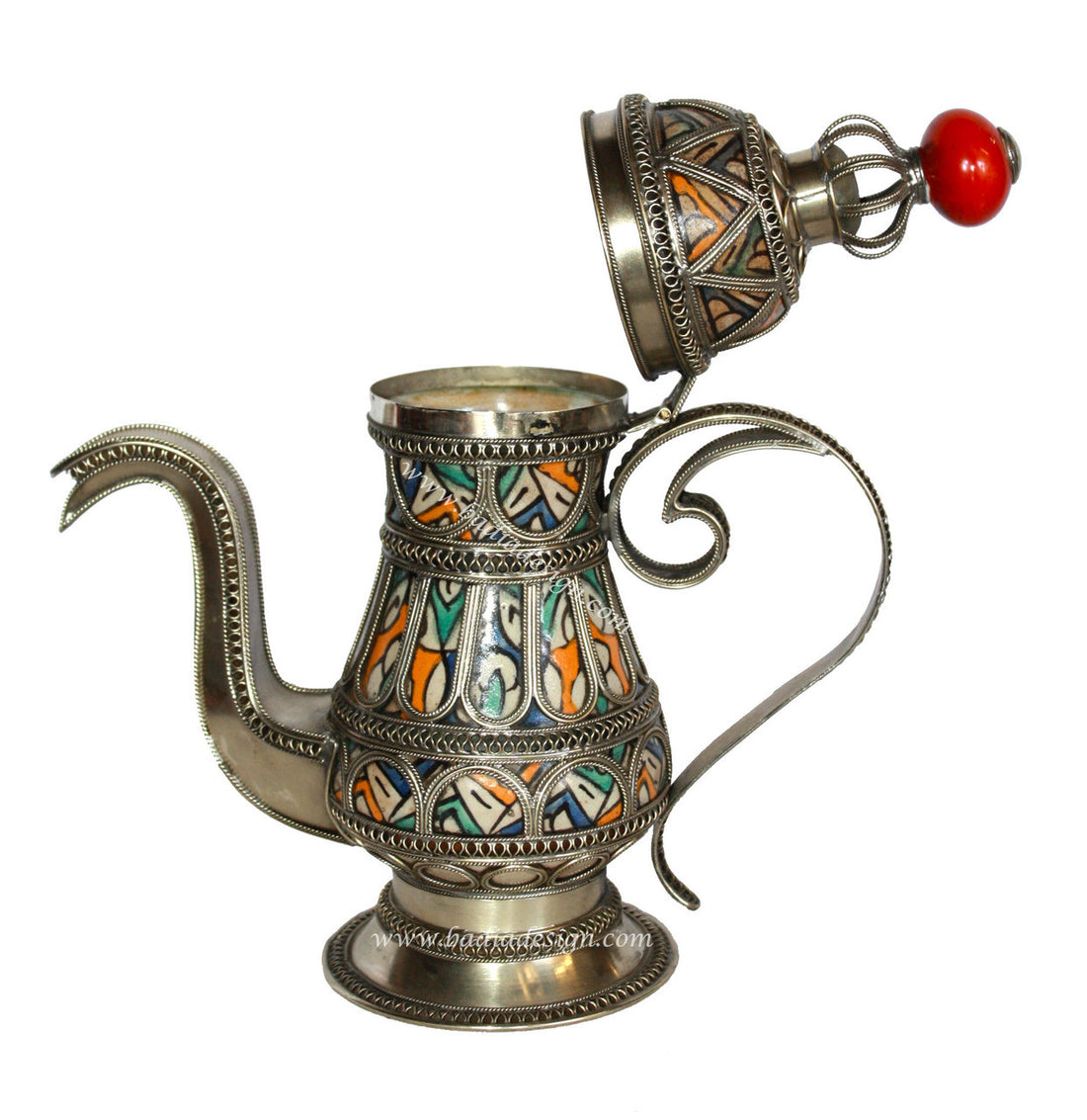 Decorative metal teapot with colorful engravings on a white background