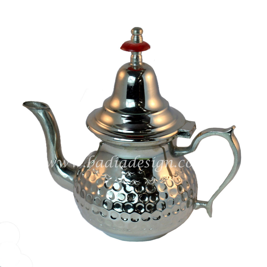 Silver teapot with textured surface and red accent on a white background