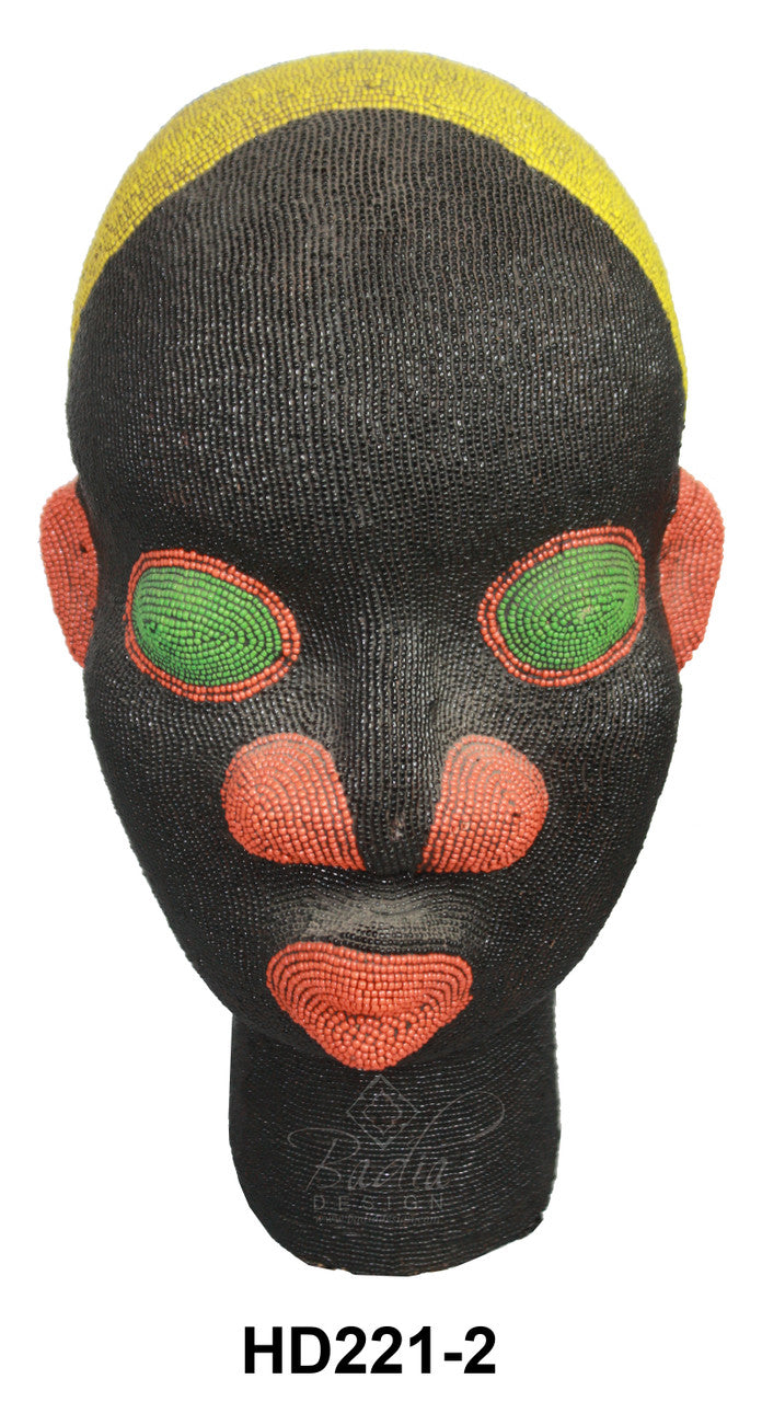 Black mask with red and green accents on a white background