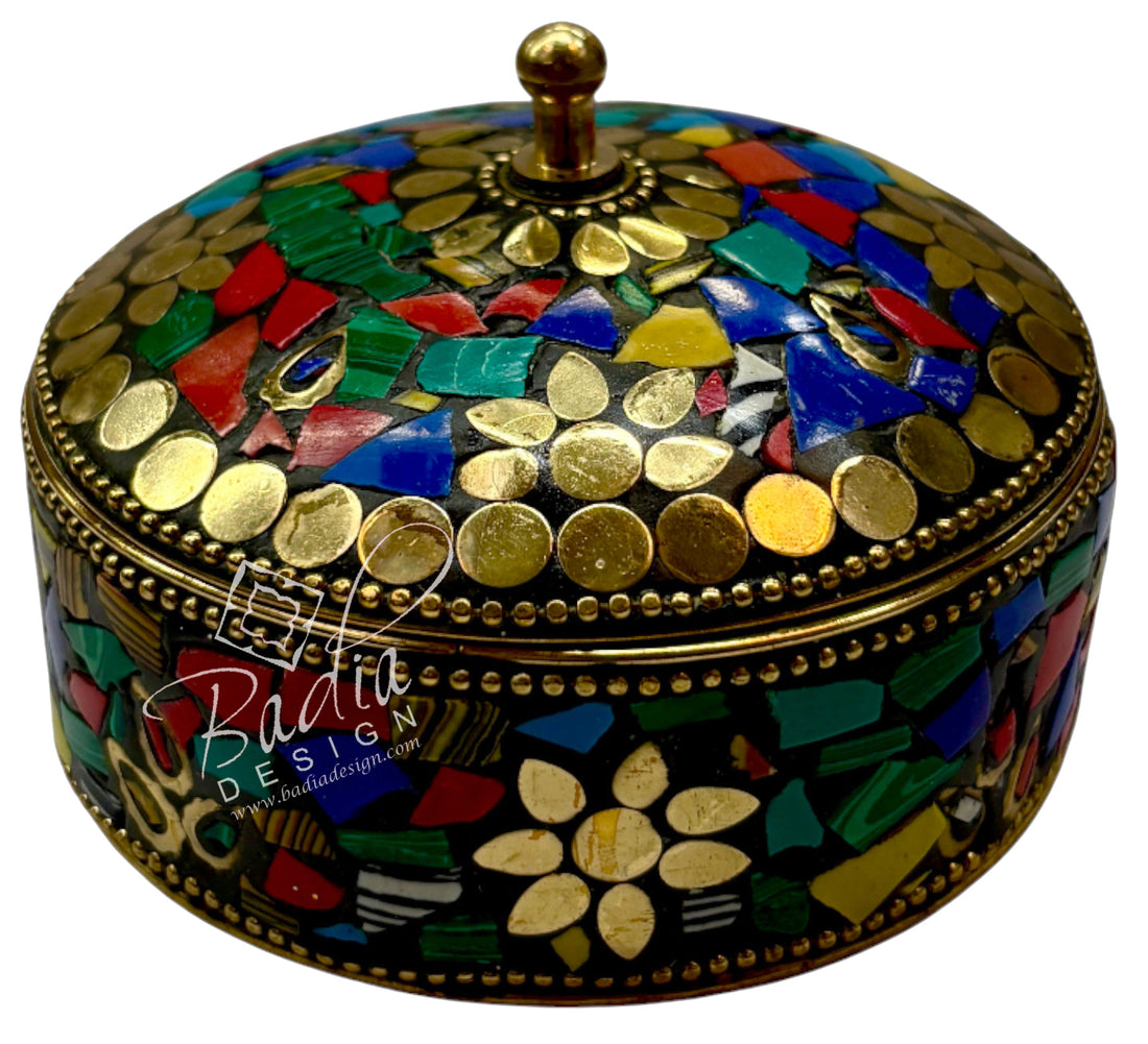 Decorative box with mosaic design and gold accents, featuring the Badia Design logo.