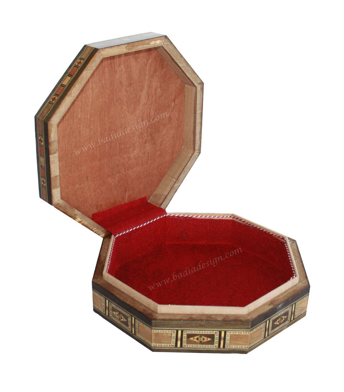 Octagonal wooden jewelry box with red interior on a white background