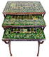 A set of three nested square tables with green mosaic tile tops and distressed dark metal legs, shown on a plain white background.