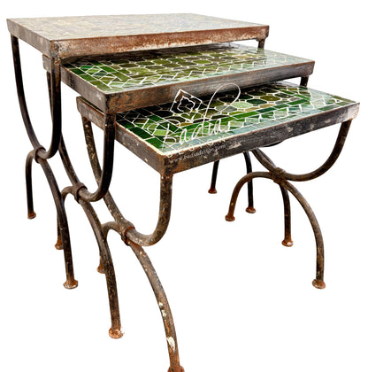 Three nested nesting tables with distressed dark brown metal frames and green mosaic tile tops, shown on a white background.