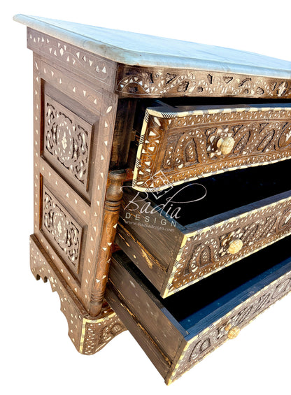 Ornate Wooden Dresser with Decorative Inlay