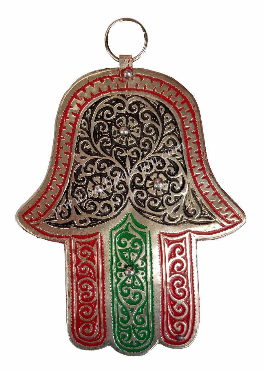 Decorative Hamsa hand pendant with red, green, and silver design on a white background