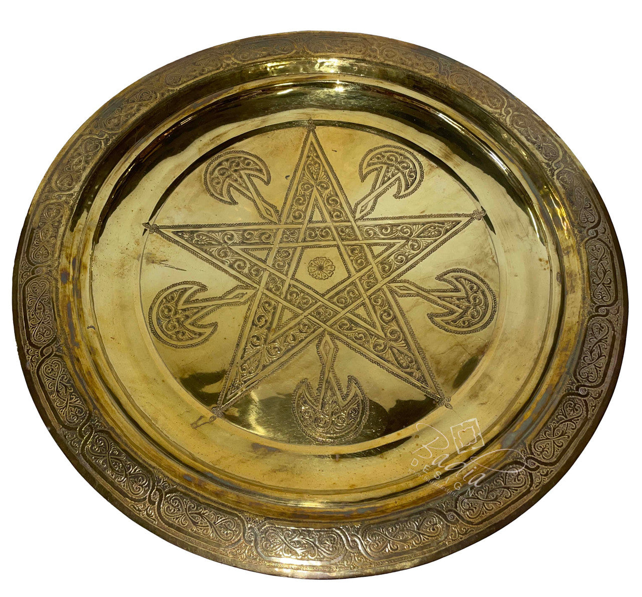 Gold decorative tray with star design on a white background