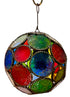 A spherical stained glass ornament featuring a mosaic of colorful glass panels in red, blue, green, yellow, and purple, framed by a distressed silver-tone metal border and suspended by a metal ring against a white background.