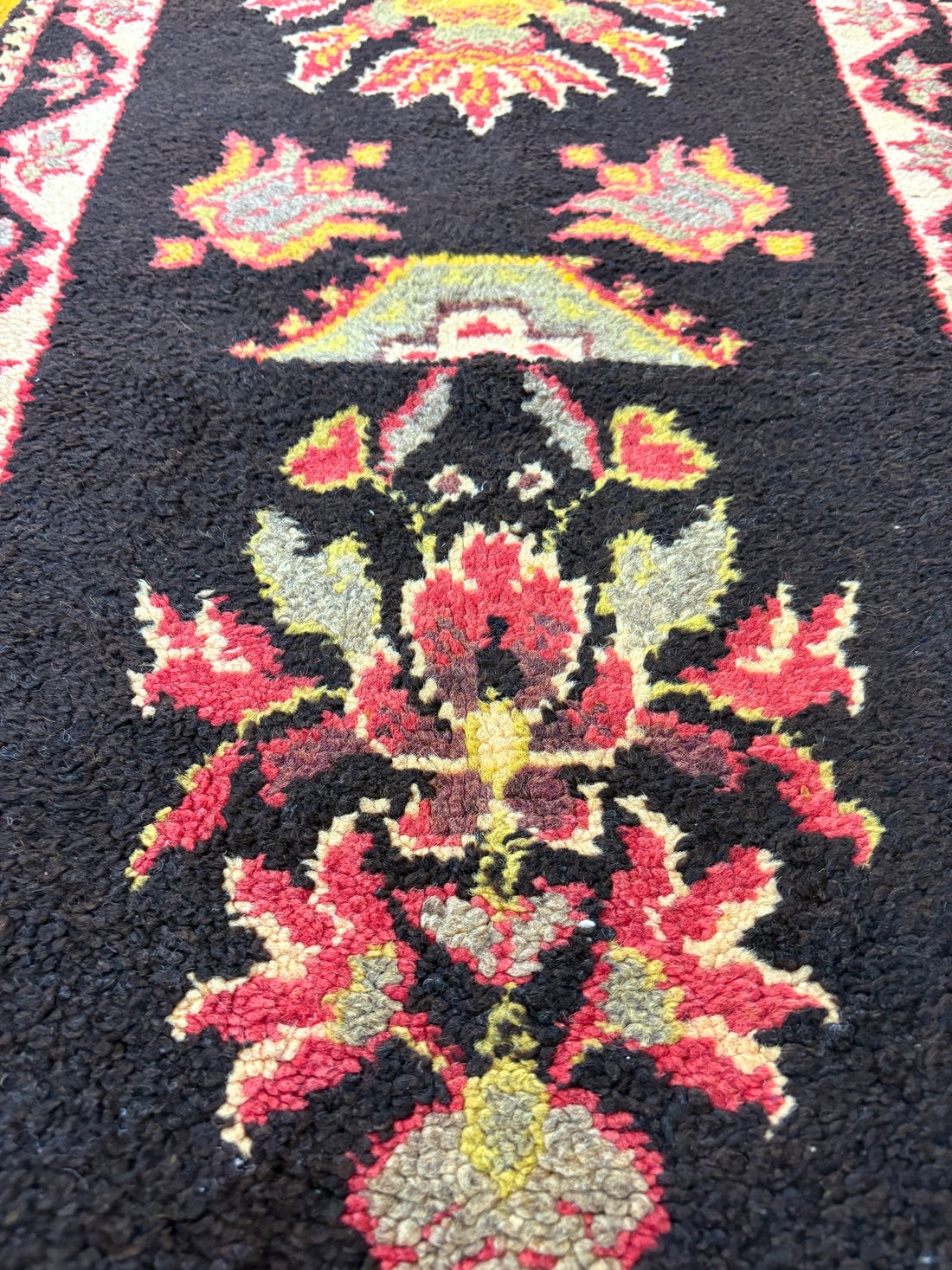Small Black and Red Floral Runner Rug