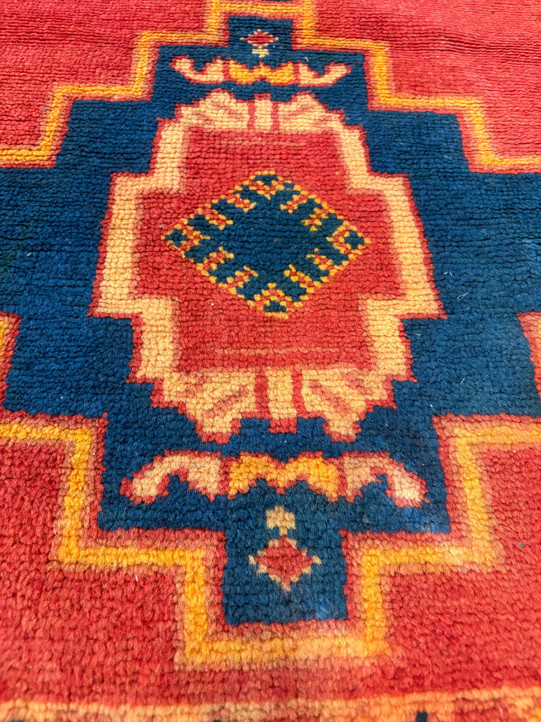 Small Red and Multi-Color Medallion Tribal Rug