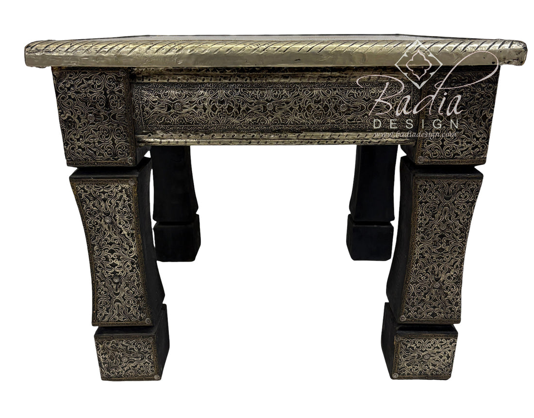 Decorative table with intricate carvings and &