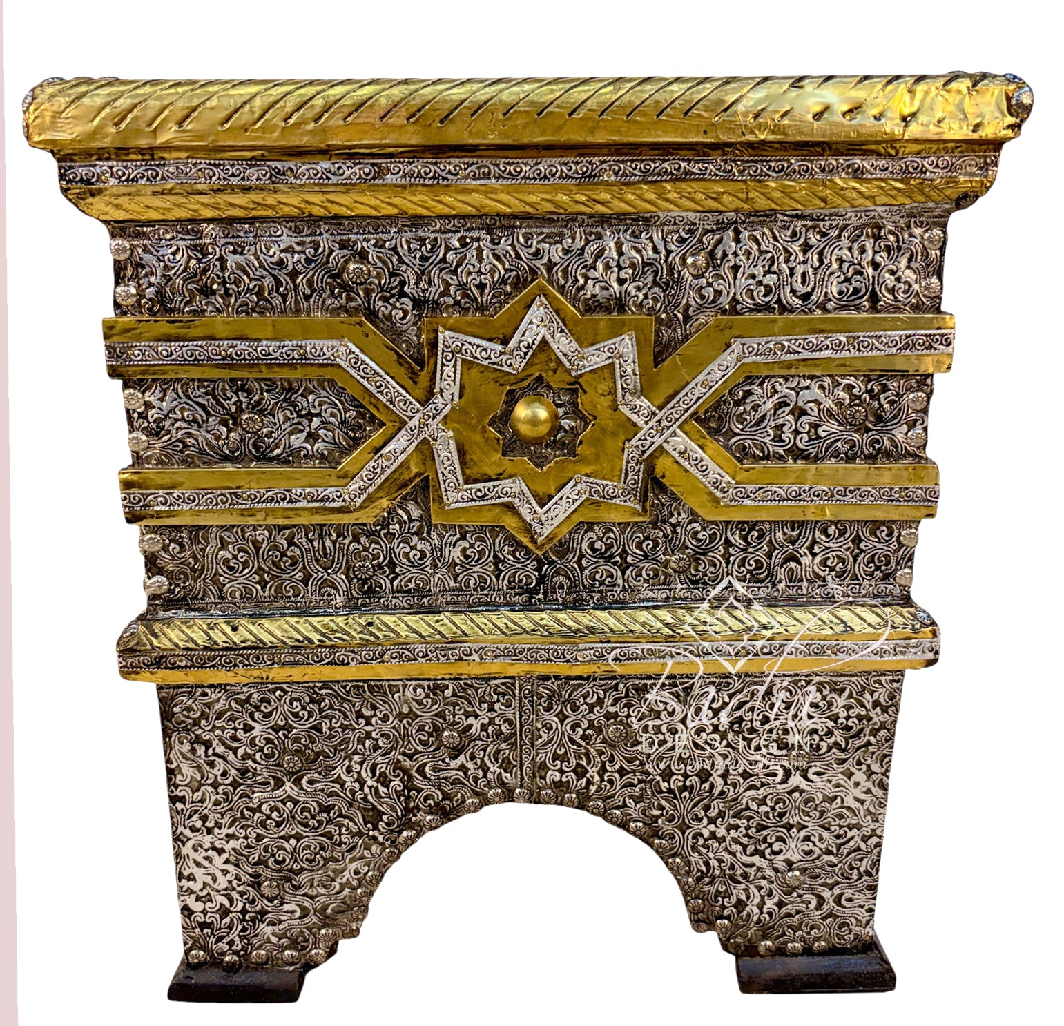 An ornate rectangular decorative chest or cabinet with intricate silver filigree carvings and gold accents, featuring a star motif on the front and a rope-textured top edge, shown against a plain white background.