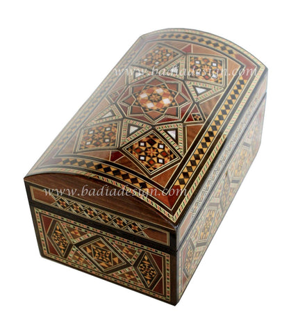 Decorative wooden box with geometric patterns on a white background