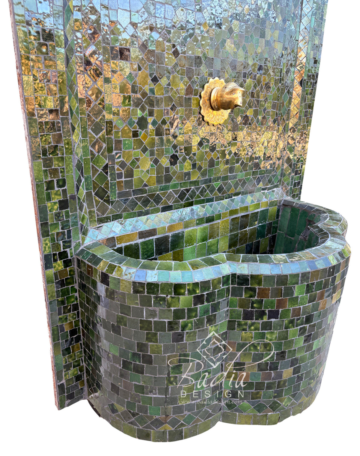 A mosaic tile garden fountain with a curved basin and matching back panel, featuring reflective green, blue, and gold tiles with a central gold shell detail, shown on a white background.