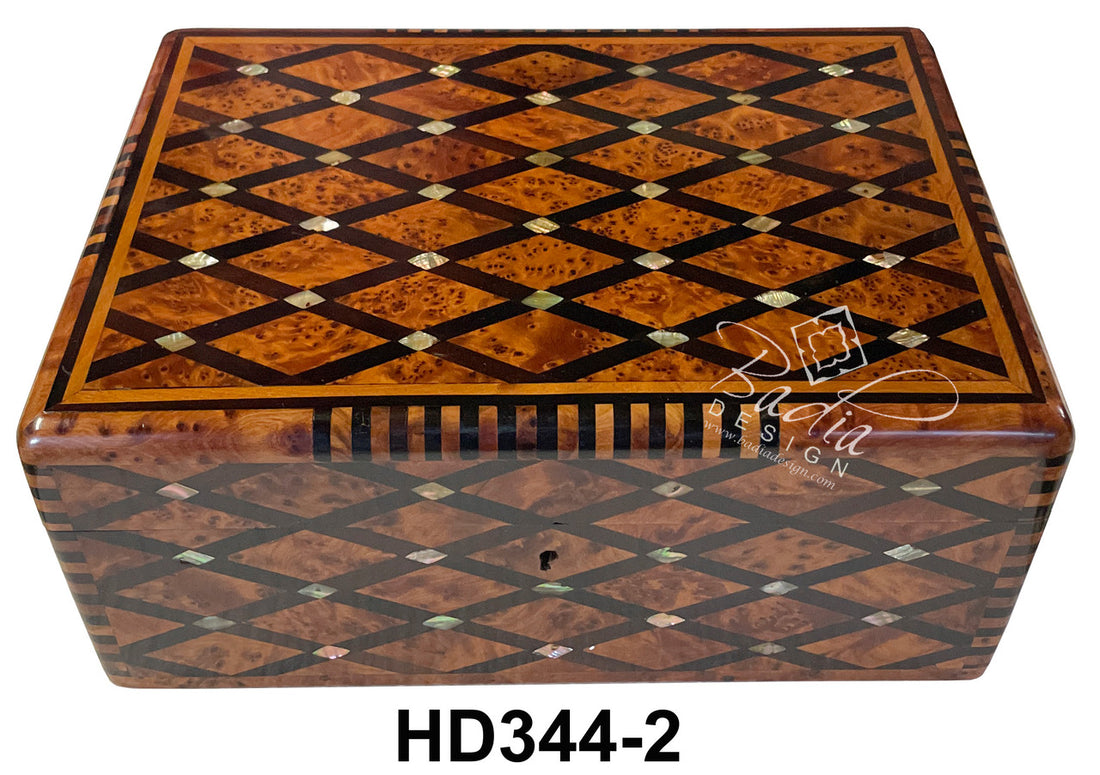 Wooden jewelry box with intricate diamond pattern and brand logo on a white background