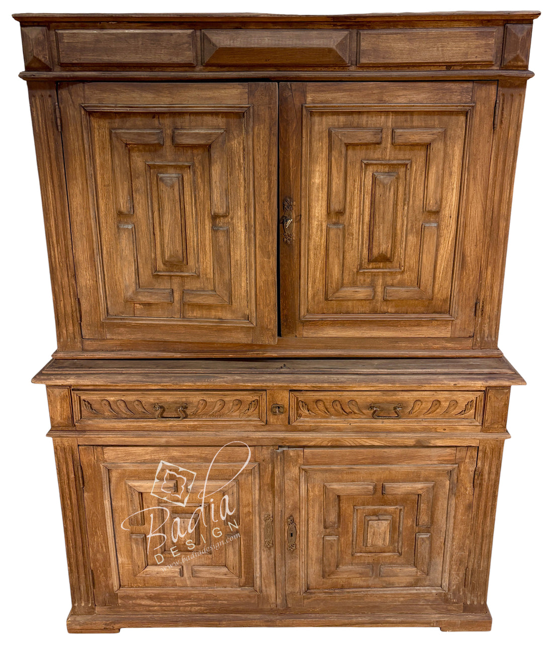 A large antique-style wooden hutch or cabinet with carved panel doors, two upper doors, two lower doors, and a central drawer section, shown against a plain white background. A semi-transparent &